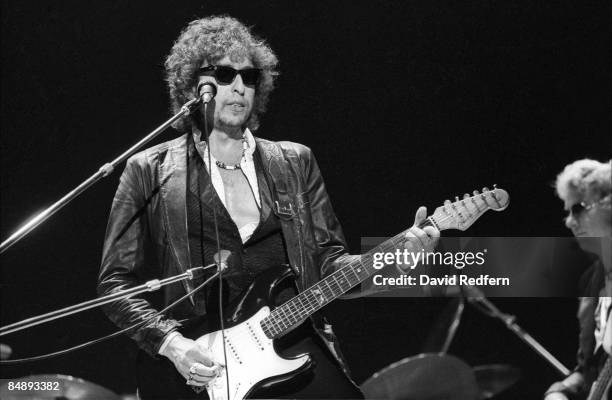 American singer, songwriter and musician Bob Dylan performs live on stage with his band during the 'Picnic' festival at Blackbushe Aerodrome in...