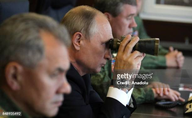 Russia's Defense Minister Sergei Shoigu , Russia's President Vladimir Putin and Russia's First Deputy Defense Minister, Chief of the General Staff of...
