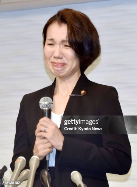 Japanese lawmaker Mayuko Toyota attends a press conference in her electoral constituency in Saitama Prefecture, near Tokyo, on Sept. 18 following a...