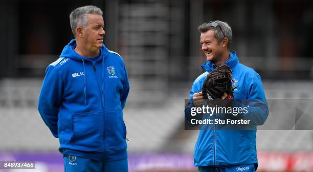 West Indies coaches Stuart Law and Toby Radford chat during their net session ahead of the Royal London Trophy against England at Old Trafford on...