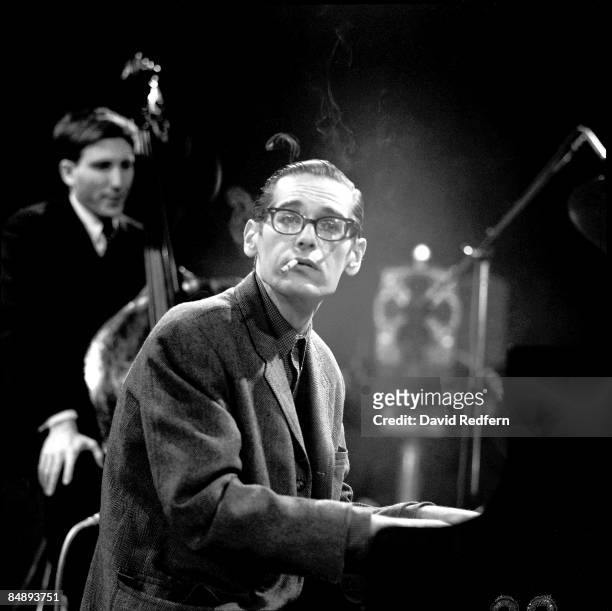American jazz pianist Bill Evans at the piano during a performance filmed for the BBC Television music series 'Jazz 625' at BBC Television Theatre in...