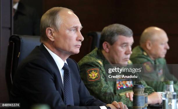 Russia's Defense Minister Sergei Shoigu , Russia's President Vladimir Putin and Russia's First Deputy Defense Minister, Chief of the General Staff of...