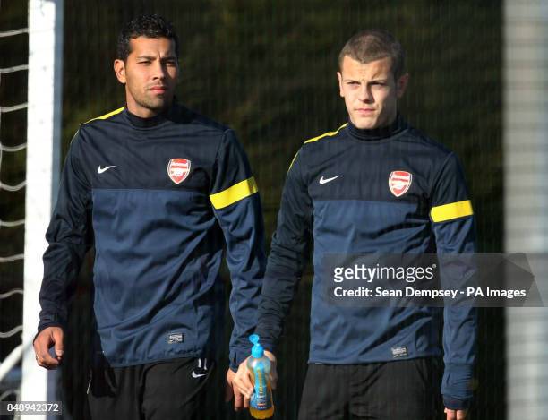 Arsenal's Andre Santos Jack Wilshere during a training session at London Colney, Hertfordshire.