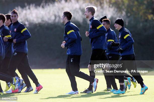 Arsenal players during a training session at London Colney, Hertfordshire.