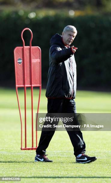 Arsenal manager Arsene Wenger during a training session at London Colney, Hertfordshire.