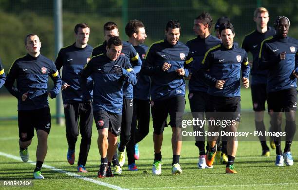 Arsenal players during a training session at London Colney, Hertfordshire.