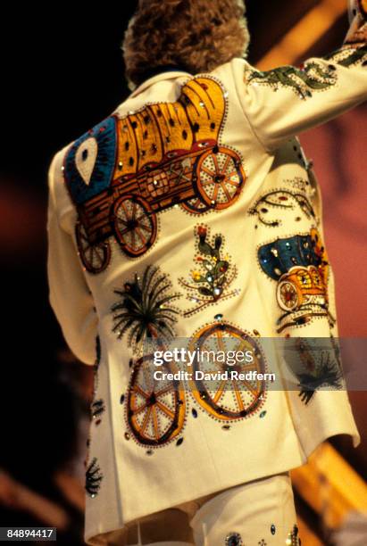 Photo of NUDI and COUNTRY and Porter WAGONER, Performing at the Country Music Festival wearing his famous Nudie suit