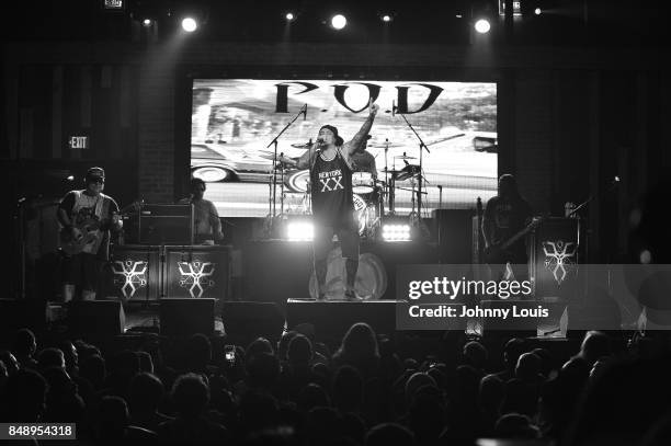 Guitarist Marcos Curiel, drummer Wuv Bernardo, vocalist Sonny Sandoval and bassist Traa Danielsl of P.O.D. Perform onstage during 'Soundboy Killaz...