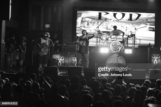 Guitarist Marcos Curiel, drummer Wuv Bernardo, vocalist Sonny Sandoval and bassist Traa Danielsl of P.O.D. Perform onstage during 'Soundboy Killaz...