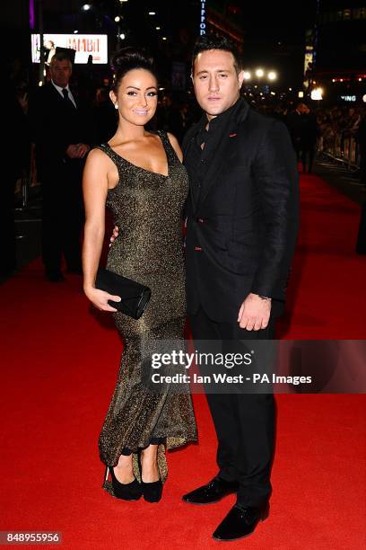 Antony Costa and guest arriving for the premiere of Gambit at the Empire Leicester Square, London.