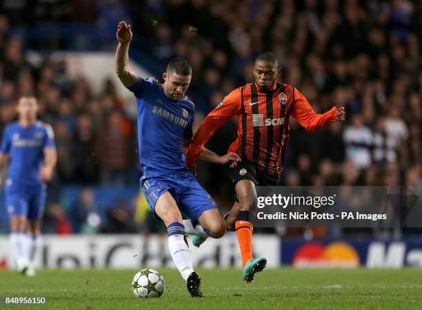 Chelsea's Gary Cahill and Shakhtar Donetsk's Luiz Adriano battle for the ball