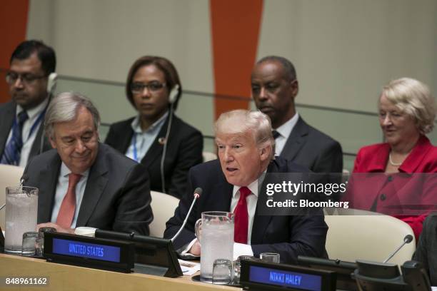 President Donald Trump, center, speaks as Antonio Guterres, United Nations secretary general, left, listens during a panel discussion at the UN...