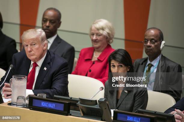 President Donald Trump, left, and Nikki Haley, U.S. Ambassador to the United Nations , listen during a panel discussion at the UN General Assembly...