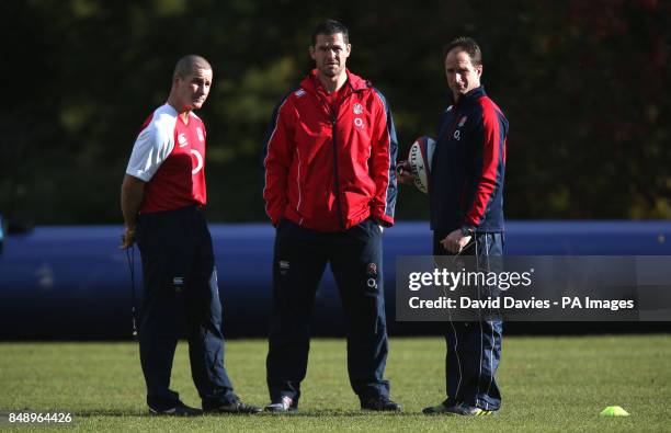 Coaches Stuart Lancaster , Andy Farrell and Mike Catt during a training session at Pennyhill Park Hotel, Bagshot, Surrey.