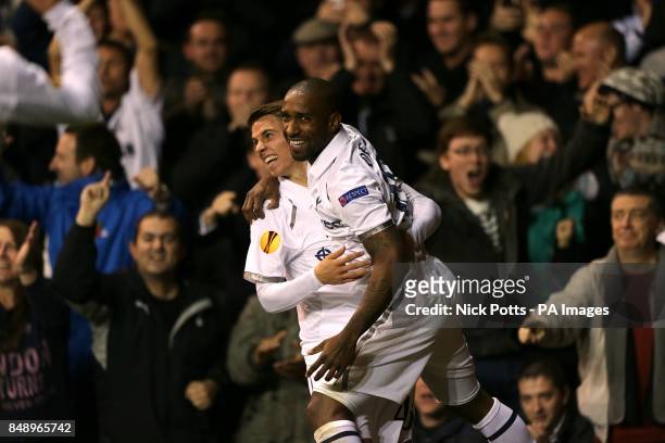 Tottenham Hotspur's Jermain Defoe celebrates scoring his side's first goal of the game with teammate Thomas Carroll