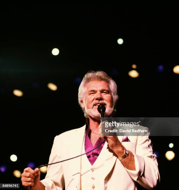 Photo of Kenny ROGERS; Kenny Rogers performing on stage