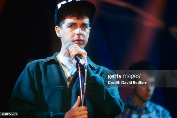Photo of PET SHOP BOYS and Neil TENNANT, Neil Tennant performing on stage