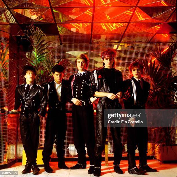 Photo of DURAN DURAN; L-R: Andy Taylor, Roger Taylor, Simon Le Bon, John Taylor, Nick Rhodes, posed, studio, group shot,