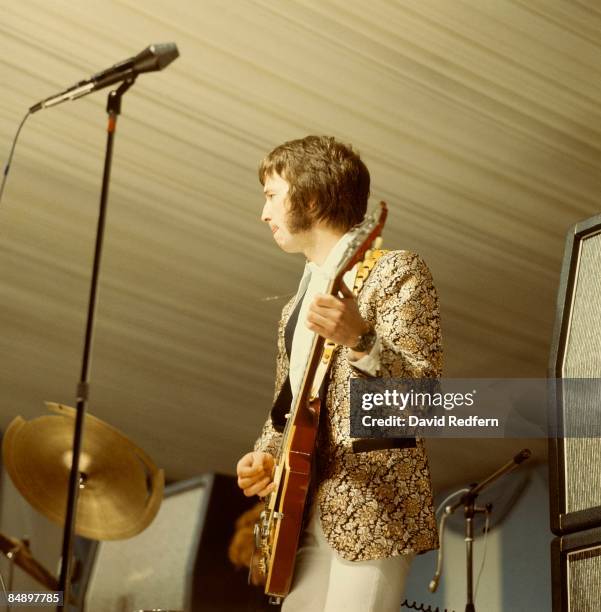 English guitarist Eric Clapton performing with Gibson Les Paul guitar with Bigsby vibrato on stage with British rock group Cream during their first...