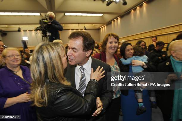 Minister for Justice Alan Shatter kisses his wife Carol at the count centre at Dublin Castle, after a referendum to enshrine children&Otilde;s rights...