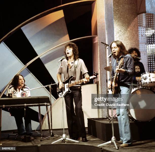 Photo of 10CC, L-R: Lol Creme , Graham Gouldman, Eric Stewart, Kevin Godley performing 'Rubber Bullets' on Top Of The Pops TV Show