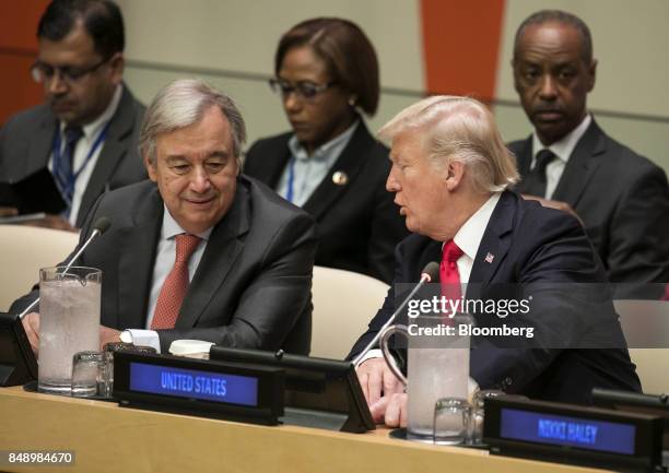 President Donald Trump, right, speaks with Antonio Guterres, United Nations secretary general, left, during a panel discussion at the UN General...