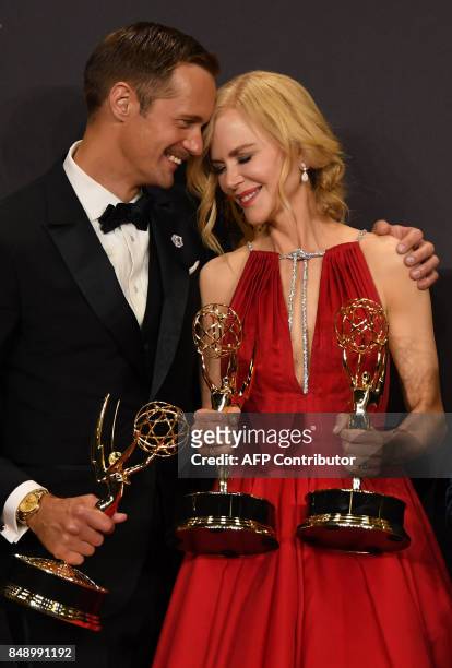 Alexander Skarsgard and Nicole Kidman pose with the award for Outstanding Limited Series for "Big Little Lies"" during the 69th Emmy Awards at the...