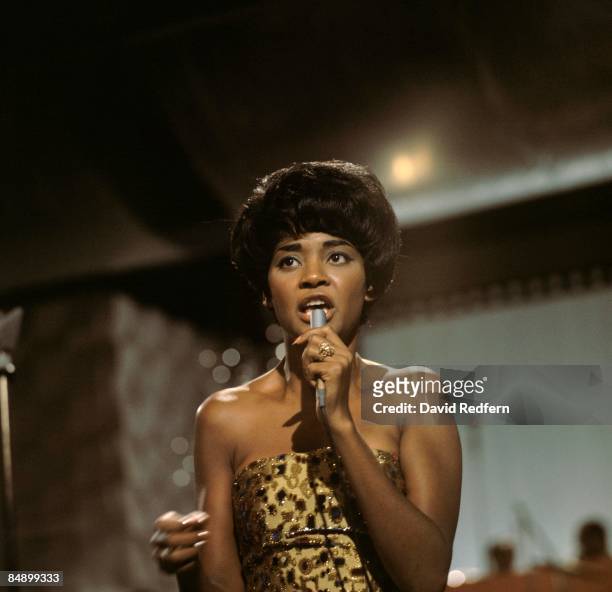 Nancy Wilson, U.S. Jazz singer, in concert, singing into a microphone, circa 1967.