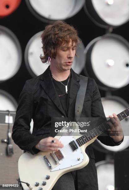 Photo of LIVE EARTH CONCERT and Jay MEHLER and KASABIAN, Jay Mehler performing live onstage at Live Earth concert, playing Gibson Firebird guitar