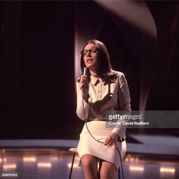 Greek singer Nana Mouskouri performs on the BBC television show 'Presenting Nana Mouskouri' at BBC Television Centre in London circa 1968.