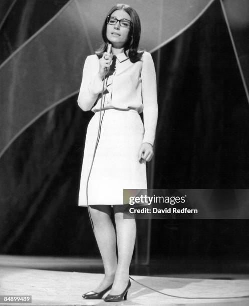 Greek singer Nana Mouskouri performs on the BBC television show 'Presenting Nana Mouskouri' at BBC Television Centre in London circa 1968.