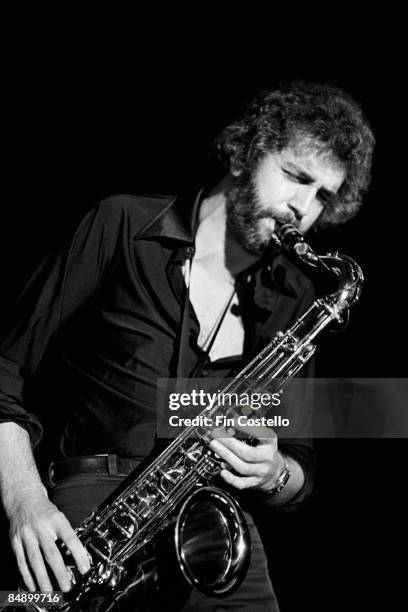 Photo of AVERAGE WHITE BAND and Roger BALL; Saxophone player Roger Ball performing on stage, 22