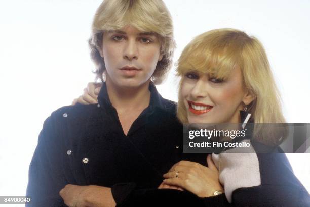 Photo of Thereza BAZAR and David Van DAY and DOLLAR; Posed studio group portrait of Dollar with David Van Day and Thereza Bazar,