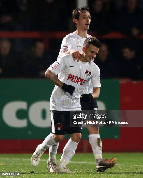 Leyton Orient's Dean Cox celebrates scoring the second goal with David Mooney who scored the first during the FA Cup First Round match at Whaddon...