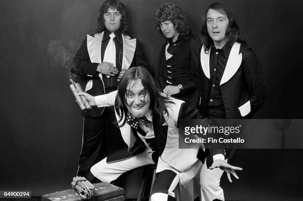 Photo of MUD and Ray STILES and Les GRAY and Rob DAVIS and Dave MOUNT; Posed studio group portrait with dynamite L-R Ray Stiles, Les Gray , Rob Davis...