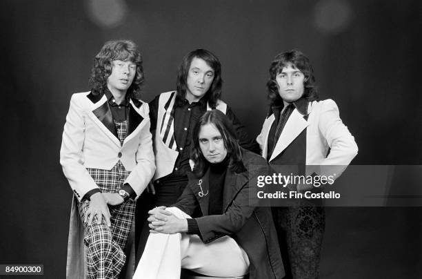 Photo of MUD and Ray STILES and Les GRAY and Rob DAVIS and Dave MOUNT; Posed studio group portrait L-R Rob Davis, Dave Mount, Les Gray and Ray...