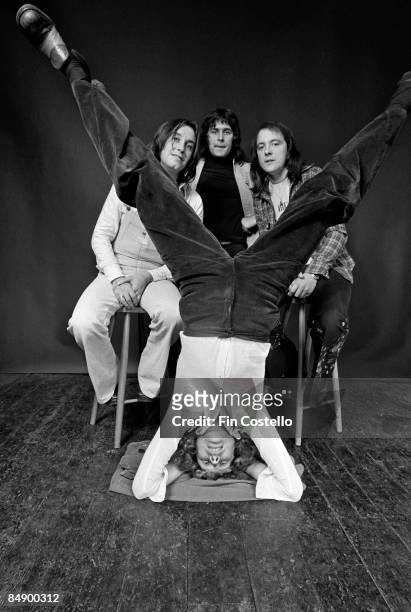 Photo of MUD and Rob DAVIS and Les GRAY and Ray STILES and Dave MOUNT; Posed studio group portrait L-R Les Gray, Ray Stiles, Dave Mount and Rob Davis...
