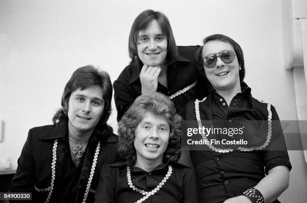 Photo of MUD and Ray STILES and Les GRAY and Rob DAVIS and Dave MOUNT; Posed studio group portrait L-R Ray Stiles, Les Gray, Rob Davis and Dave...