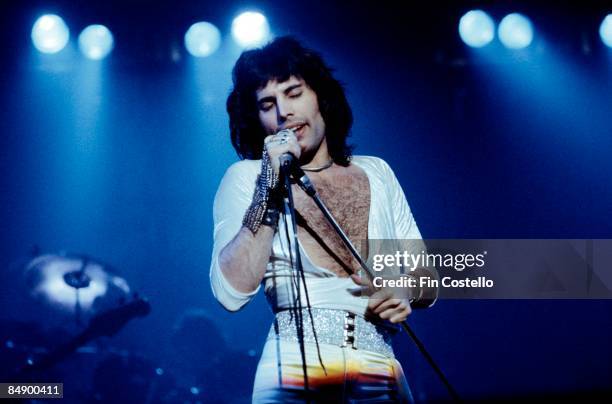 Photo of Freddie MERCURY and QUEEN; Freddie Mercury performing live on stage,