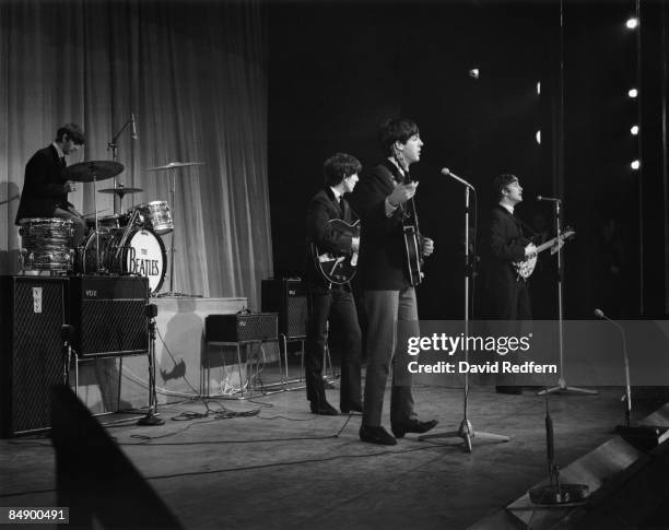 English rock and pop group The Beatles, from left, Ringo Starr, George Harrison , Paul McCartney and John Lennon perform on stage during rehearsals...