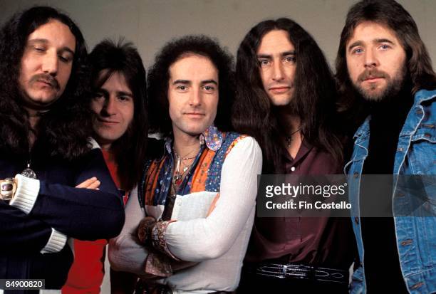 Uriah Heep, posed group portrait L-R Mick Box, Trevor Bolder, John Lawton , Ken Hensley and Lee Kerslake, circa 1976.