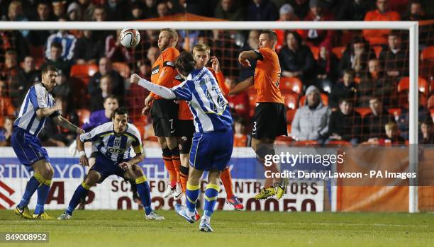Kilmarnock's Cillian Sheridan scores during the Clydesdale Bank Scottish Premier League match at Tannadice Park, Dundee.