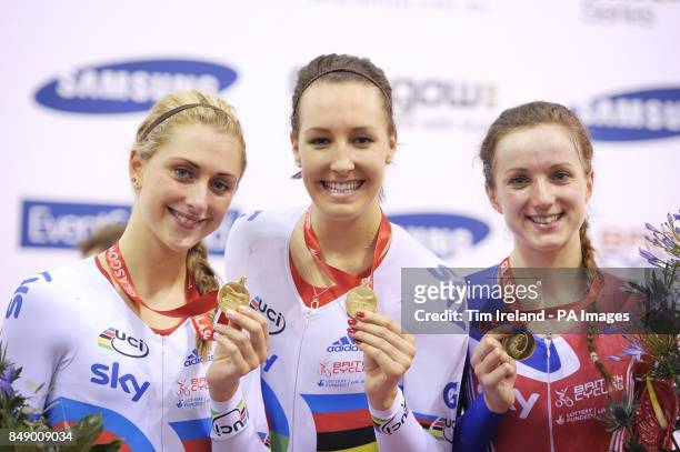 Great Britain's team pursuit squad of Laura Trott, Dani King and Elinor Barkerwith their gold medals during day one of the UCI Track Cycling World...