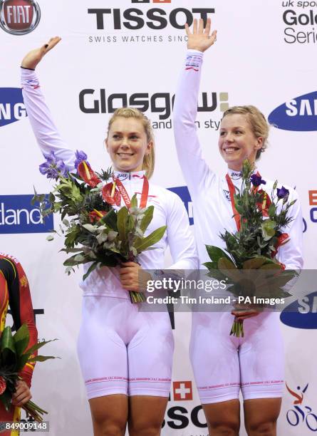 Great Britain's Jess Varnish and Becky James celebrate gold in the team sprint during day one of the UCI Track Cycling World Cup at the Sir Chris Hoy...