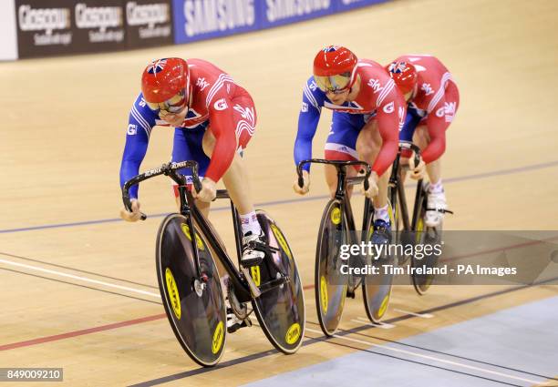 Great Britain's Jason Kenny , Philip Hindes and Ed Clancy ride to silver during day one of the UCI Track Cycling World Cup at the Sir Chris Hoy...