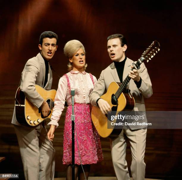 English pop folk group The Springfields, featuring from left, Mike Hurst, Dusty Springfield and Tom Springfield, perform together on a television...