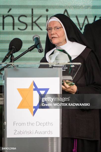 Sister Antonietta Fracek from Franciscan Sisters of the Monastery of Mary speaks during the "From The Depths Zabinski Awards" ceremony, honoring...