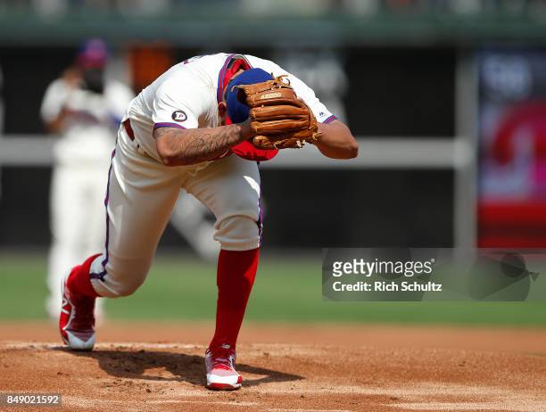 Pitcher Henderson Alvarez of the Philadelphia Phillies gets set to deliver his first pitch against the Oakland Athletics during the first inning of a...