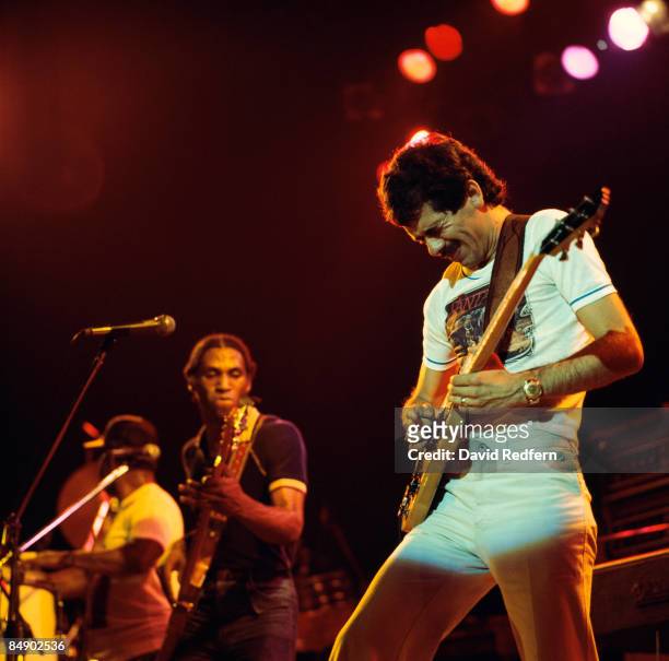 Mexican born American guitarist Carlos Santana performs live on stage with the rock group Santana in London during the Welcome tour in November 1973....