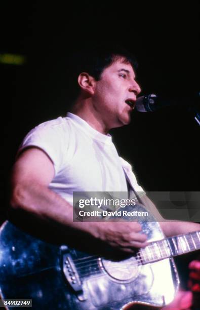 Photo of Paul SIMON, Paul Simon performing on stage